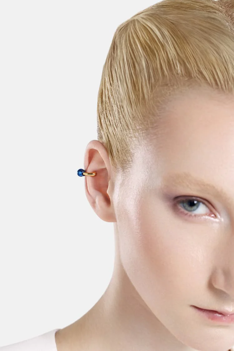 Casa Batlló huggie earcuff in gold and blue - Image 2