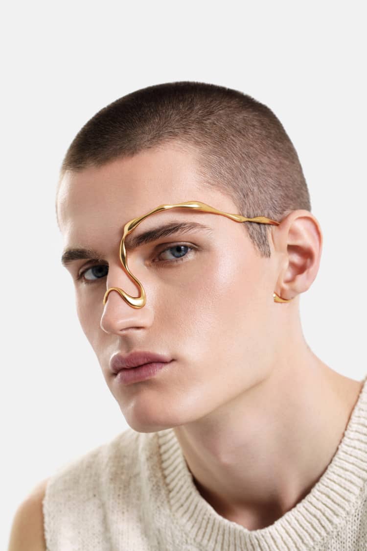 organic-shaped face jewelry in gold