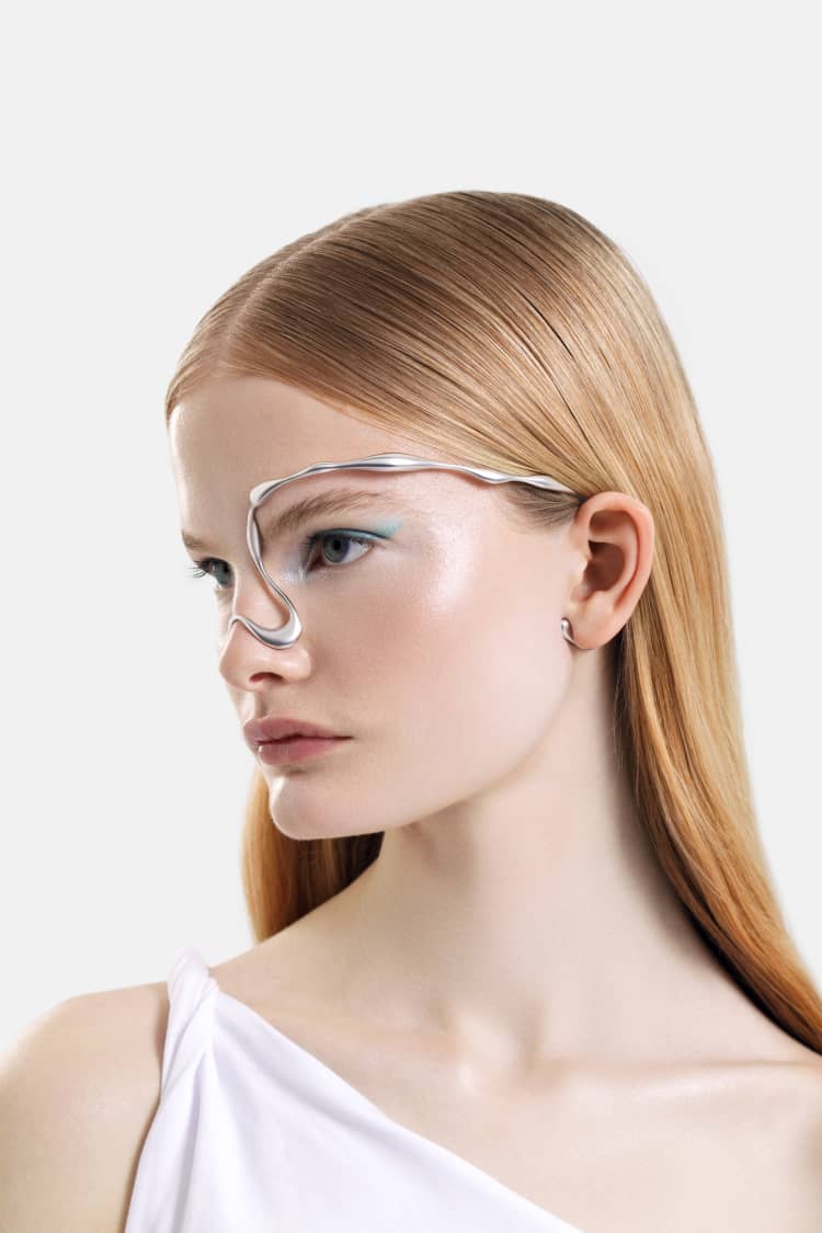 organic-shaped face jewelry in silver